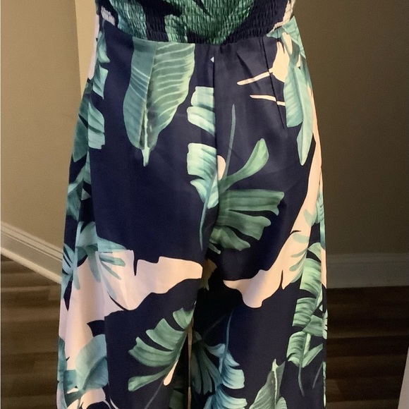 Lulus: Size M
Rain Forest Floral Strapless Jumpsuit Smocked Back For stretch - Picture 7 of 9